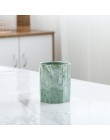 Nowoczesne porcelanowe organizery na kosmetyki pędzle na toaletkę do łazienki modne oryginalne