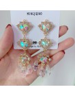 MENGJIQIAO nowy koreański błyszczące serce kryształowe kolczyki dla kobiet moda obudowa Rhinestone Boucle D'oreille Party Jewele