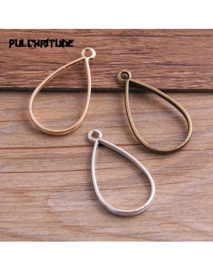 PULCHRITUDE 10 sztuk 20*37mm trzy kolory biżuteria ze stopu akcesoria kropla wody urok Hollow klej pusty wisiorek taca Bezel 12C