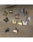 100 sztuk 11mm x 13mm Metal miedź motyl filigranowy okłady złącza urok DIY biżuteria akcesoria ustalenia materiały do biżuterii