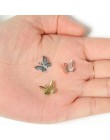 100 sztuk 11mm x 13mm Metal miedź motyl filigranowy okłady złącza urok DIY biżuteria akcesoria ustalenia materiały do biżuterii