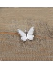 100 sztuk 11mm x 13mm Metal miedź motyl filigranowy okłady złącza urok DIY biżuteria akcesoria ustalenia materiały do biżuterii