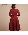 Elegancka klasyczna suknia damska trapezowa do łydek z długim rękawem zabudowana pod szyję